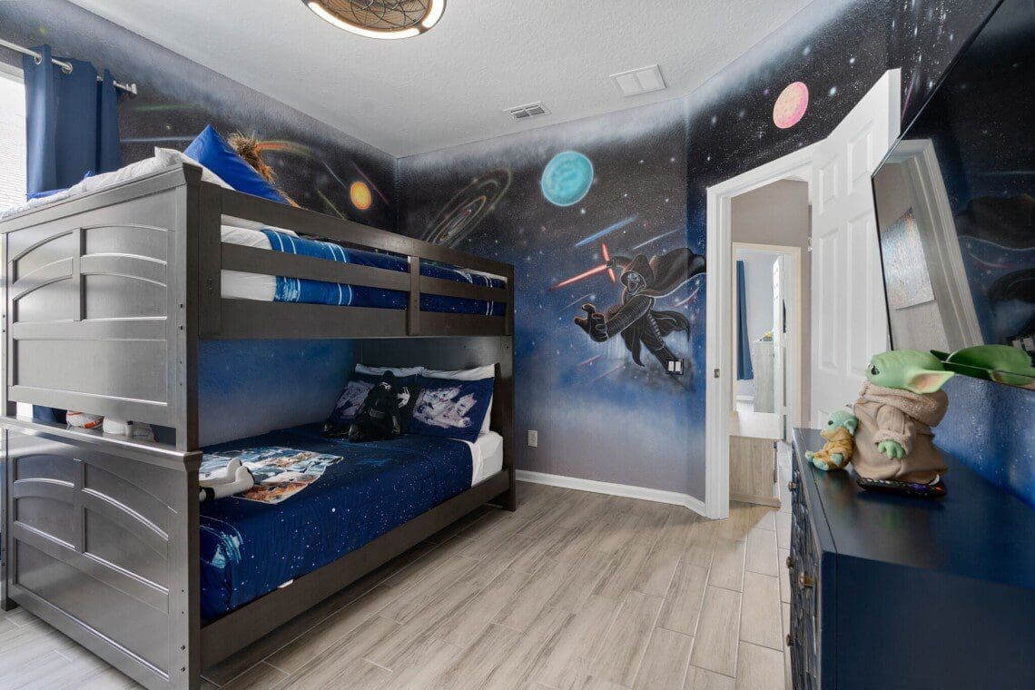 Star Wars-themed double bed in a kid-friendly room at one of the top family-friendly resorts near Disney World