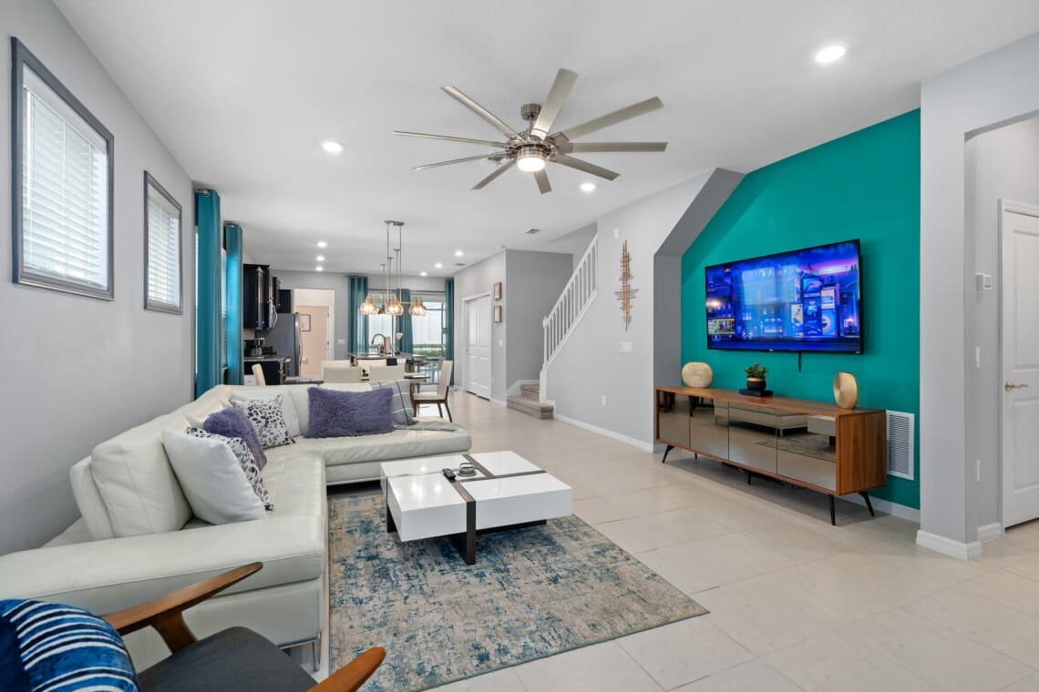 Modern living area inside a Windsor Island Resort vacation home, showing why many travelers ask: Is Windsor Island Resort high end, with stylish décor, open layout, and upscale finishes.