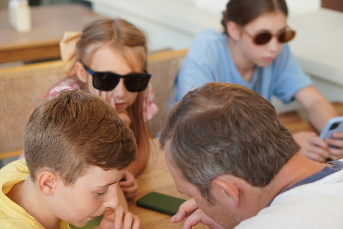 Family checking Disney vacation cost 2026 near Disney World.